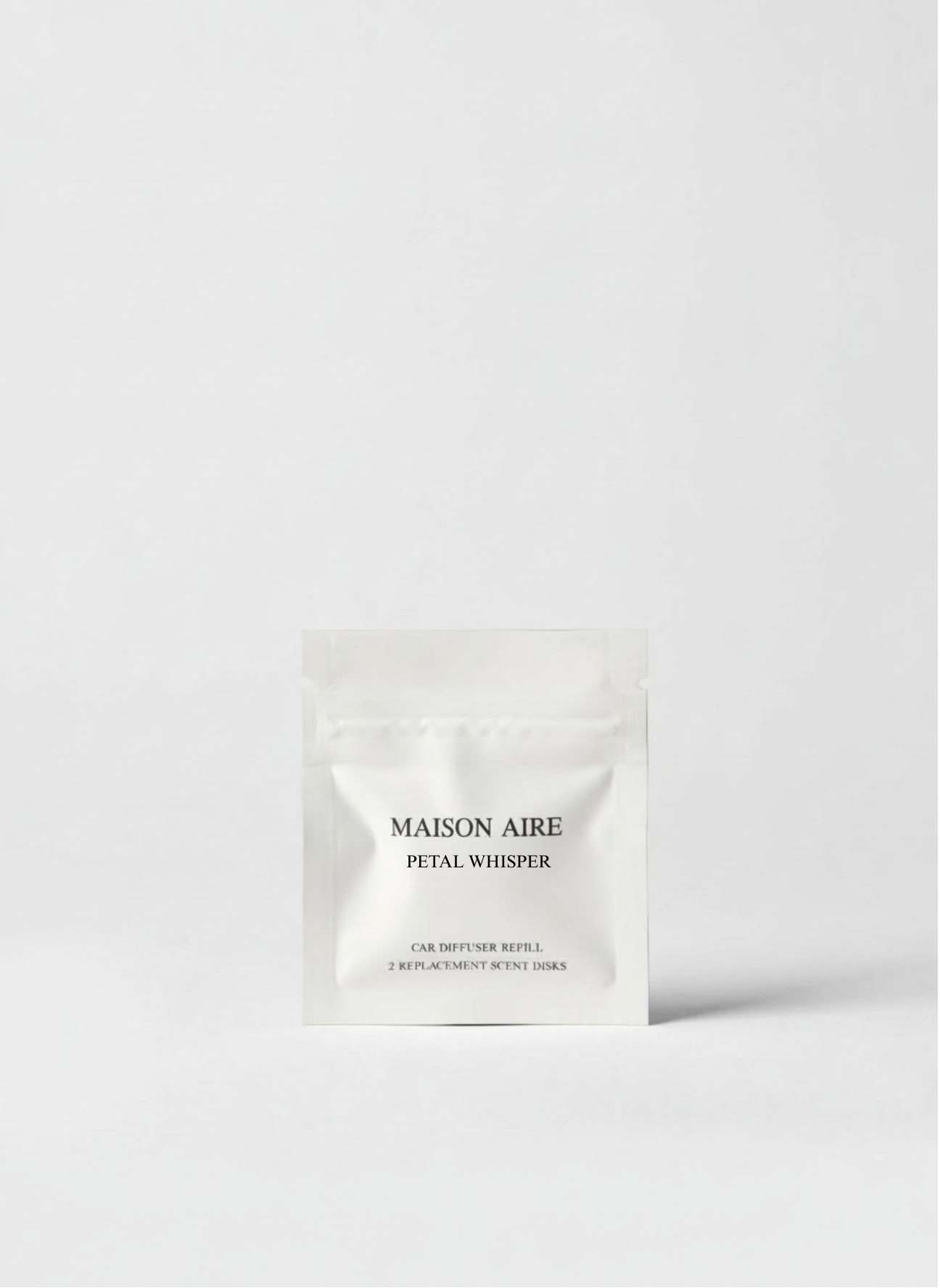 Maison Aire Petal Whisper car diffuser refill pack with two replacement scent disks on white background
