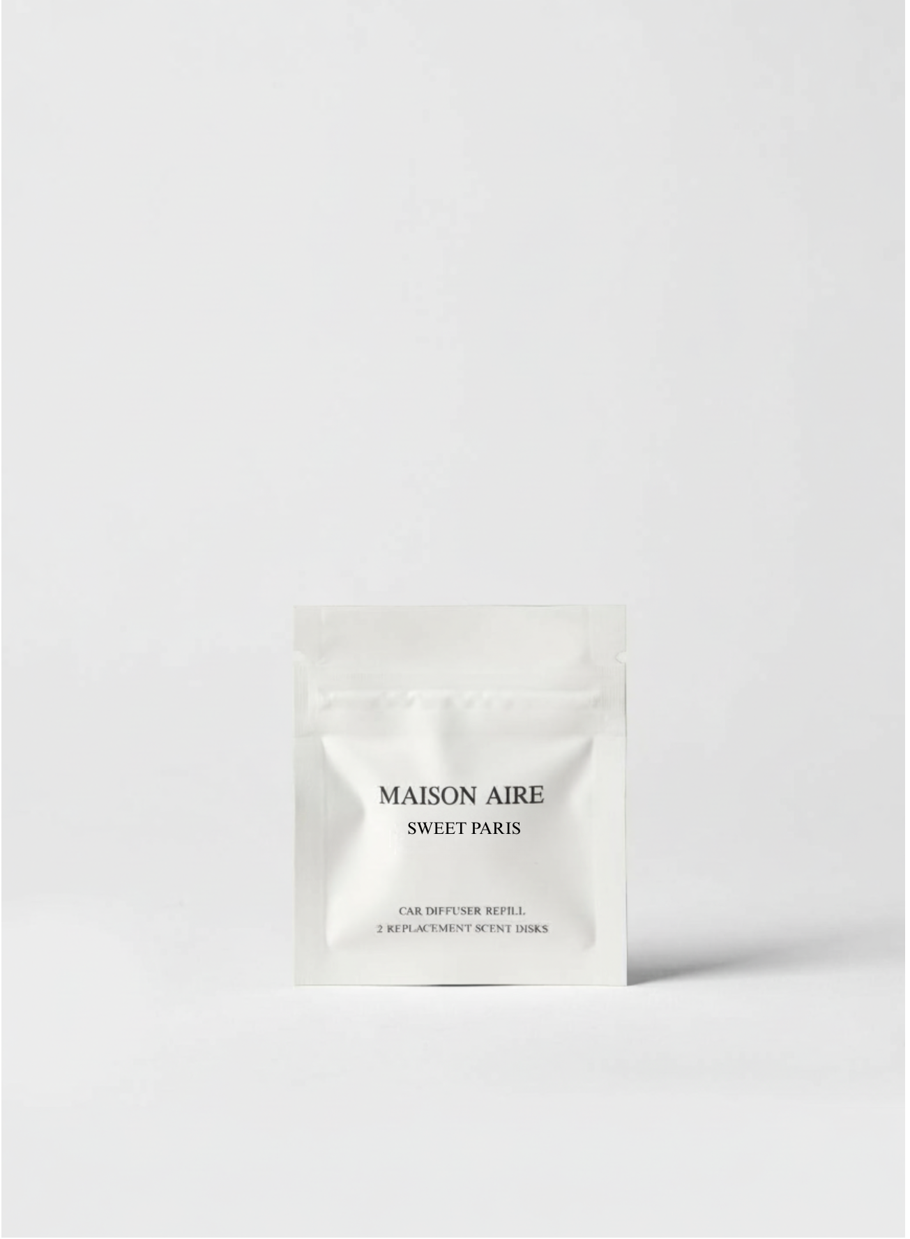 Maison Aire Sweet Paris car diffuser refill package with 2 replacement scent disks