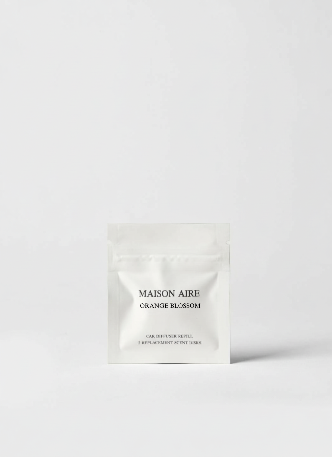 Maison Aire Orange Blossom car diffuser refill pack with two replacement scent disks in white pouch, scent inspired by Giorgio Armani My Way 