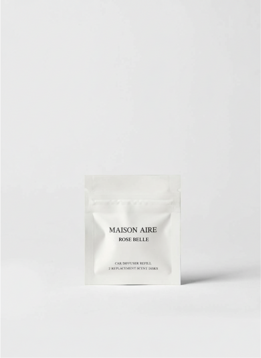 Maison Aire Rose Belle car diffuser refill pack with two replacement scent disks on white background, scent inspired by Miss Dior 